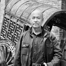 骆继明