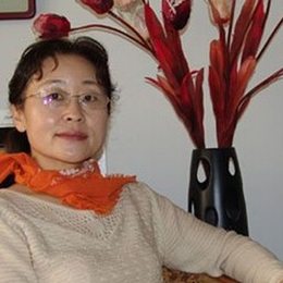 何丽